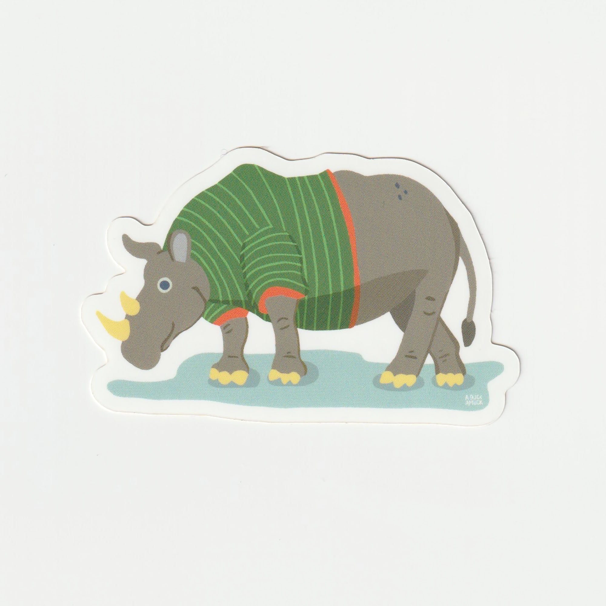 A colorful vinyl sticker featuring a rhinoceros wearing a t-shirt, ideal for personalizing items.