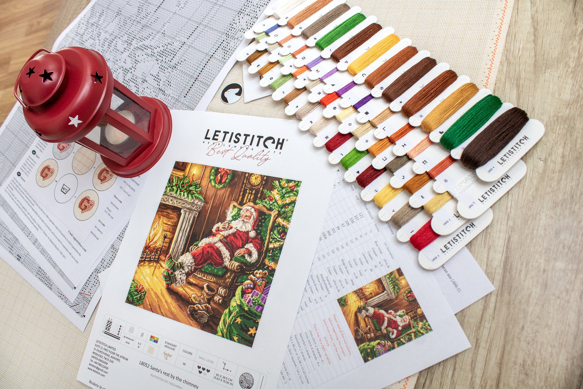 Santa's Rest by the Chimney L8052 Counted Cross Stitch Kit featuring vibrant colors and detailed design.