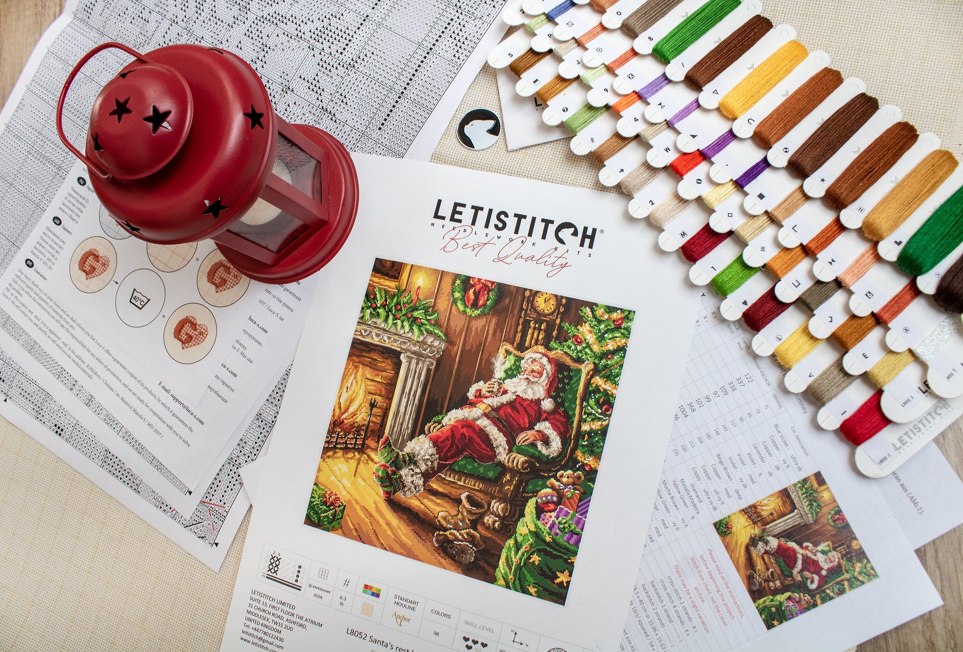 Santa's Rest by the Chimney L8052 Counted Cross Stitch Kit featuring vibrant colors and detailed design.