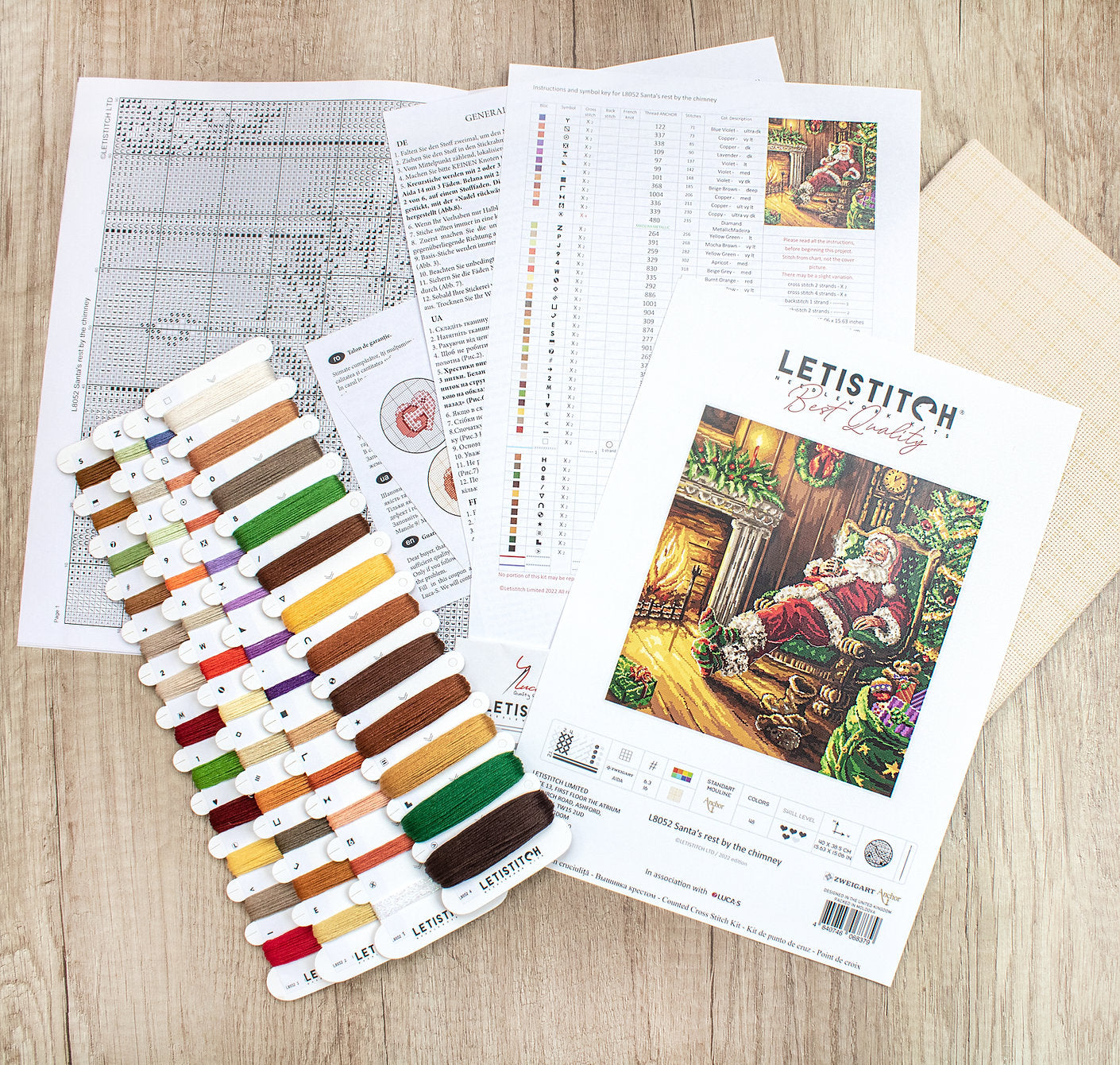 Santa's Rest by the Chimney L8052 Counted Cross Stitch Kit featuring vibrant colors and detailed design.