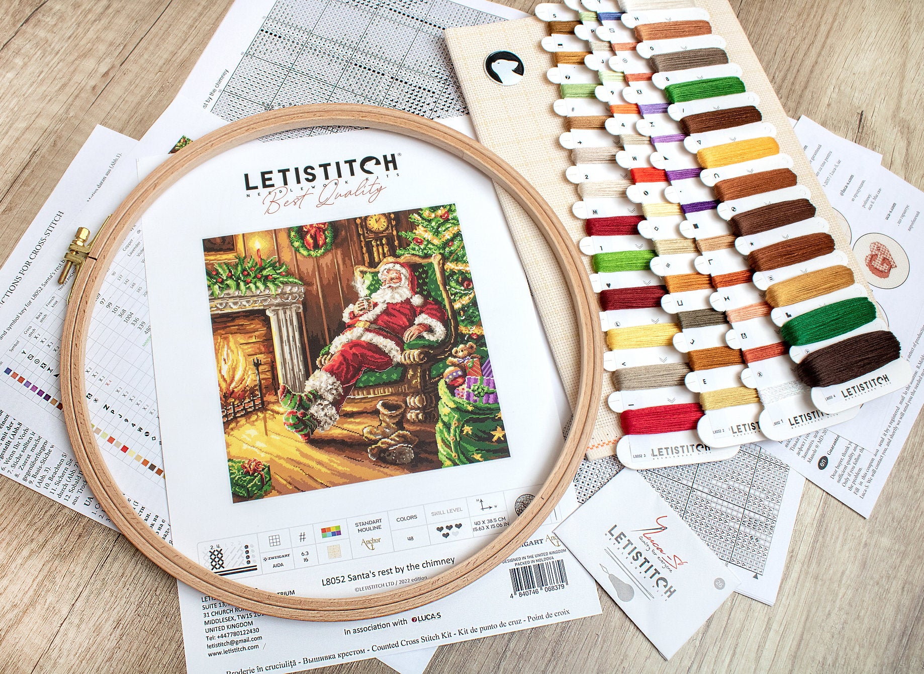 Santa's Rest by the Chimney L8052 Counted Cross Stitch Kit featuring vibrant colors and detailed design.