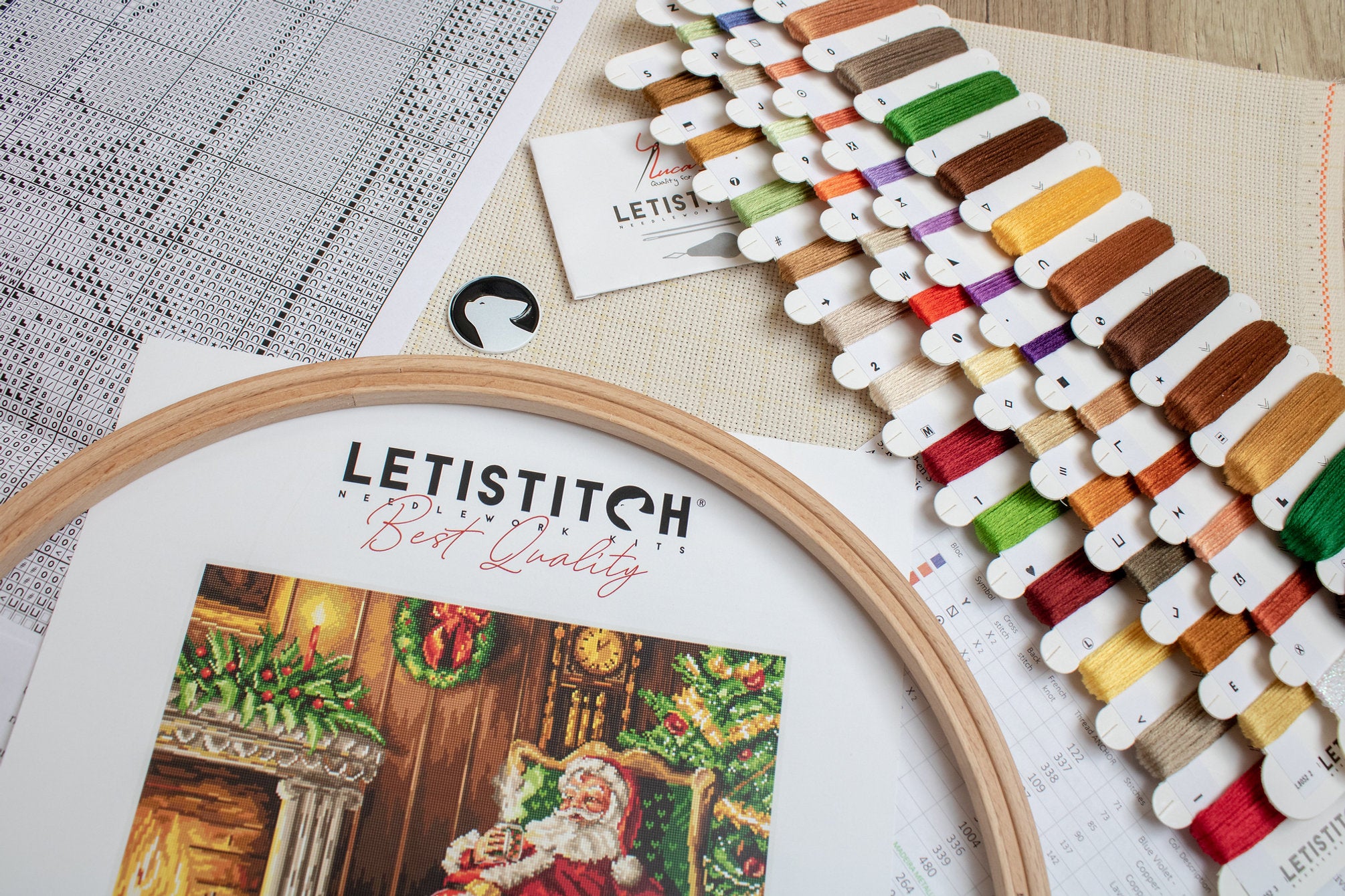 Santa's Rest by the Chimney L8052 Counted Cross Stitch Kit featuring vibrant colors and detailed design.