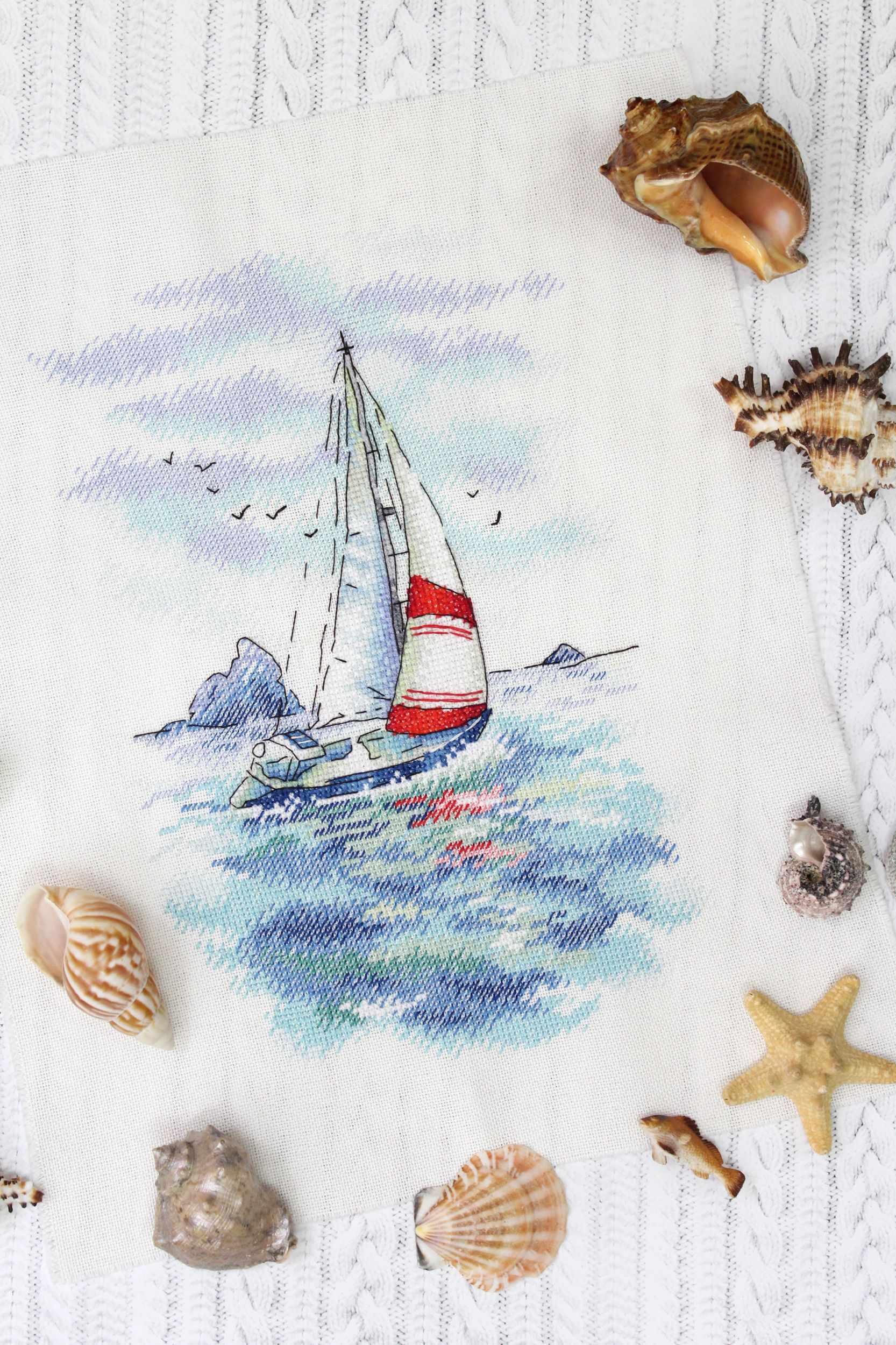 Sea Regatta SA-009 Cross-stitch kit featuring a sailing ship design in vibrant blue and green waters, perfect for crafting enthusiasts.