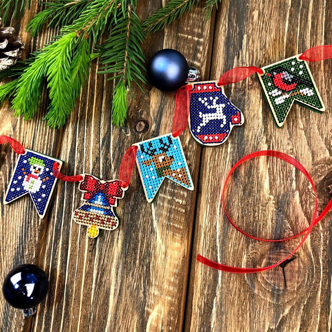 Set of 20 wooden embroidery blanks with intricate designs, perfect for creative needlework projects.