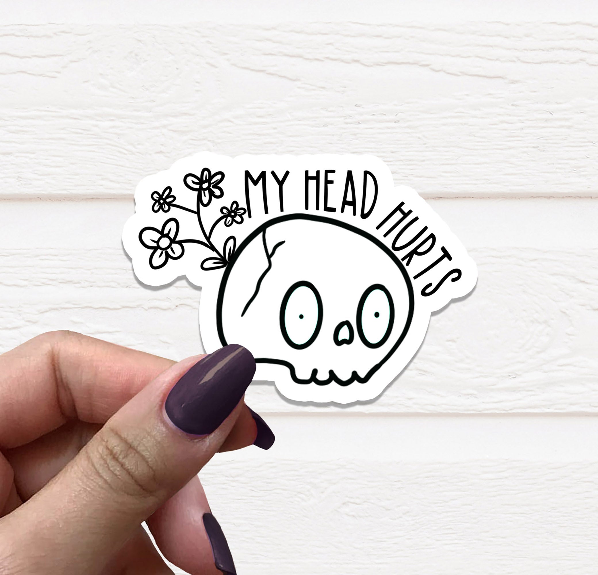 A stylish Skull Vinyl Sticker on a matte background, showcasing intricate details and vibrant colors.