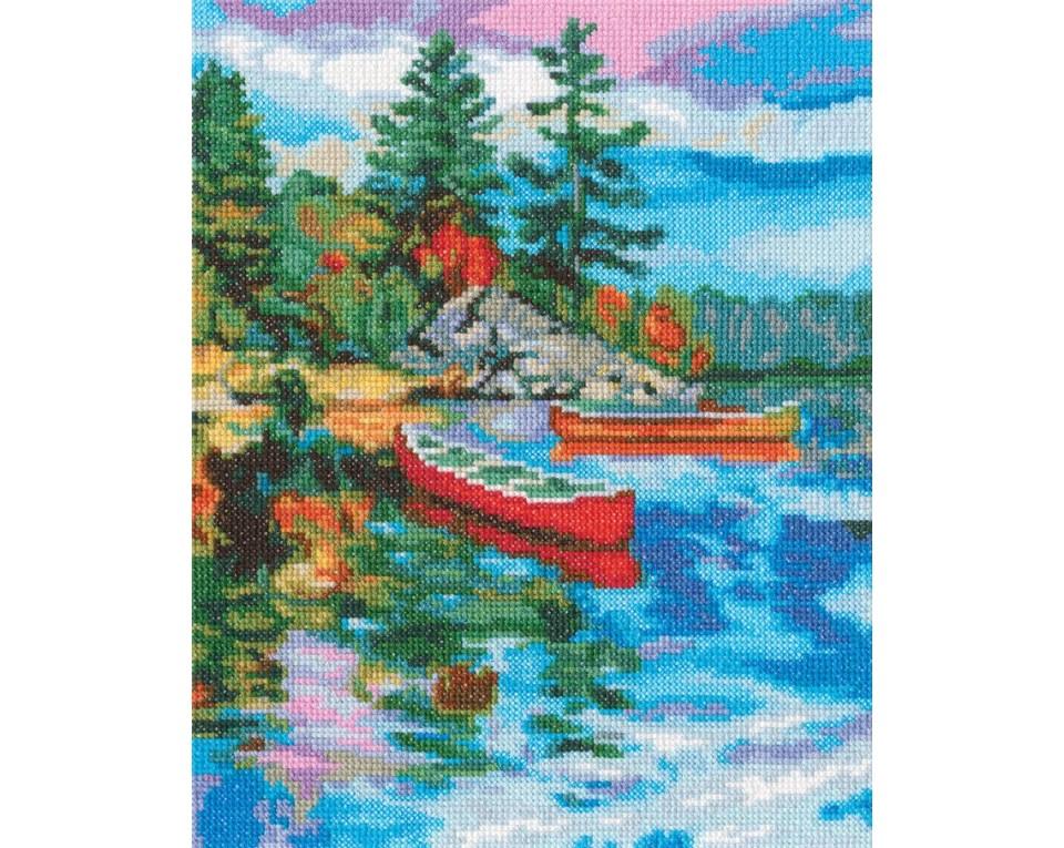 Sky Reflection M975 Counted Cross Stitch Kit featuring white Aida fabric, colorful threads, and a detailed chart for stitching.