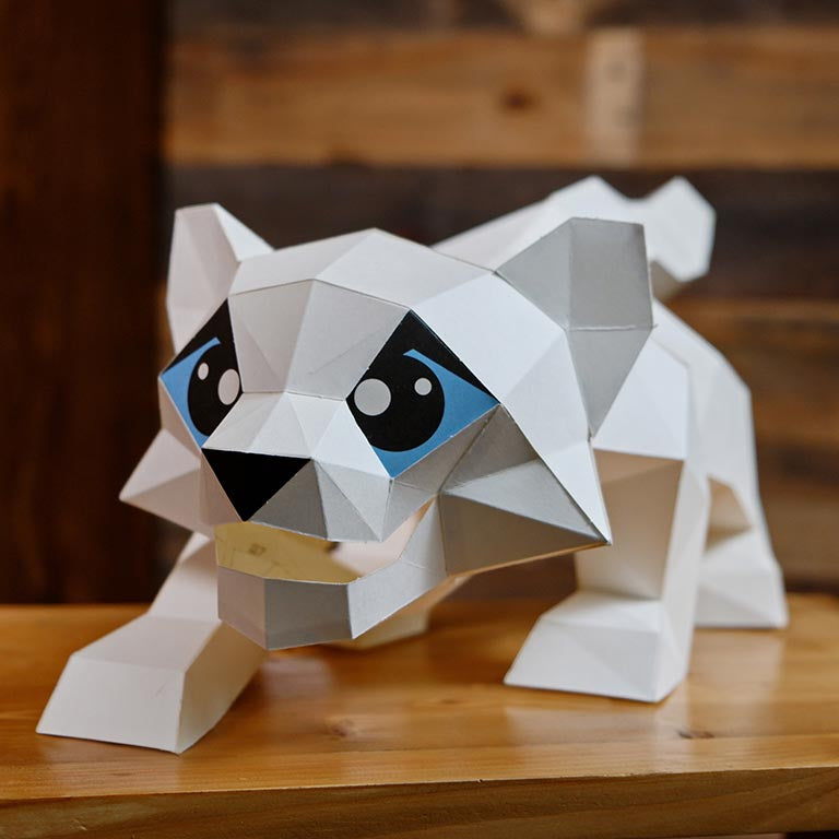 A beautifully crafted Snow Leopard Model lamp made from pre-cut paper, showcasing intricate details and a unique design.