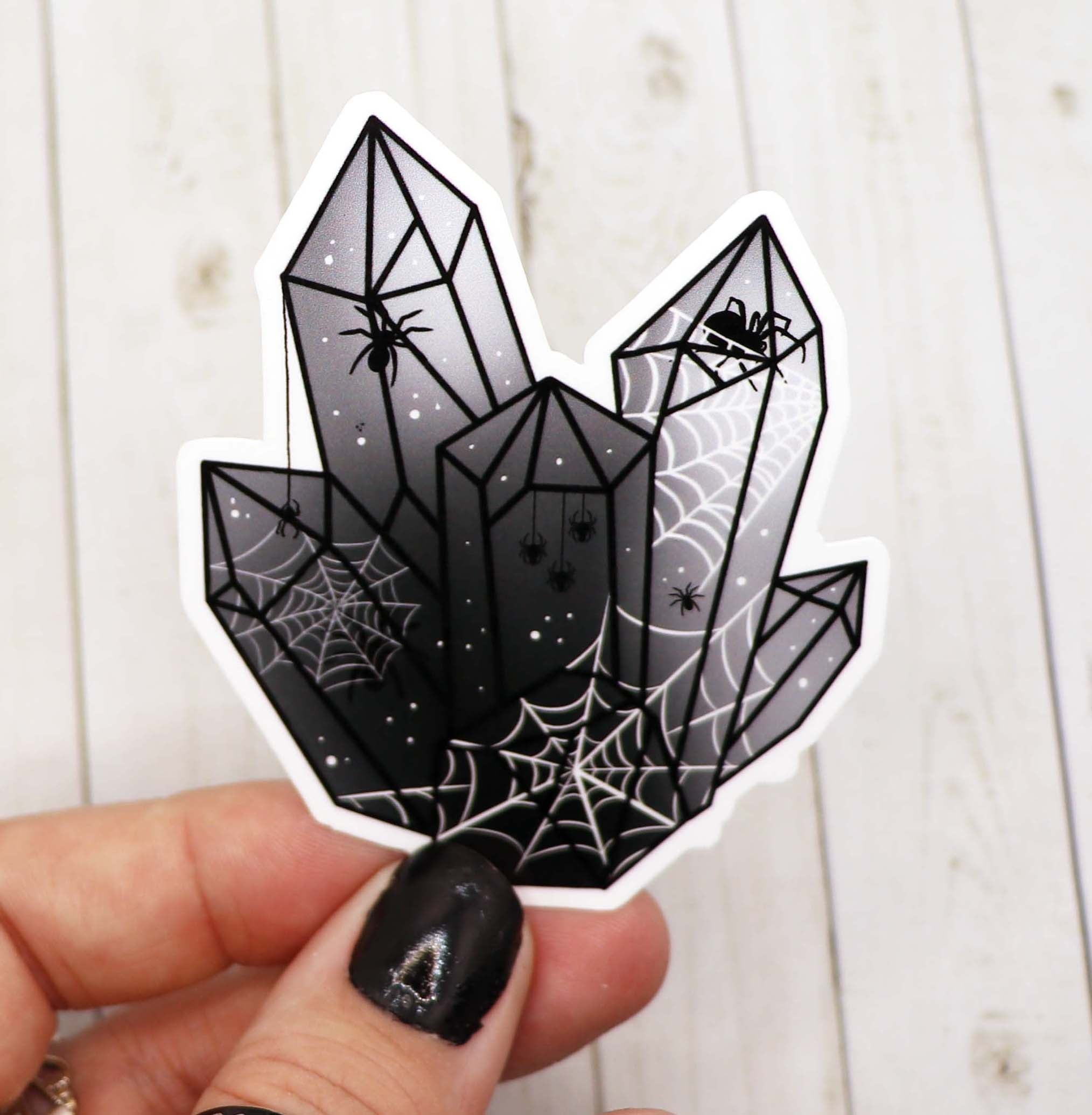 A vibrant Spider Crystal Vinyl Sticker on a white background, showcasing its intricate design and matte finish.