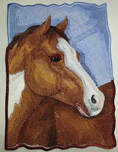 Embroidered patch featuring an American Paint Horse design, showcasing intricate stitching and vibrant colors on a cotton base.