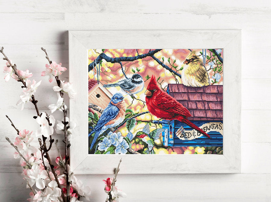 Springtime Songbirds counted cross stitch kit featuring vibrant colors and Aida canvas.