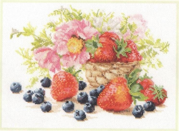 A vibrant cross-stitch kit featuring strawberries, including white aida fabric, colorful threads, and an embroidery needle.