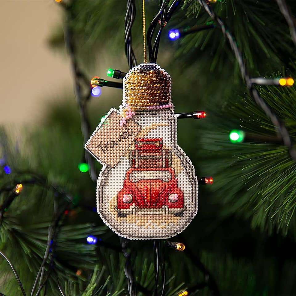 T-84C Counted Cross Stitch Kit 'Travel' featuring colorful Madeira cotton floss and Preciosa Ornela beads on a plastic canvas.