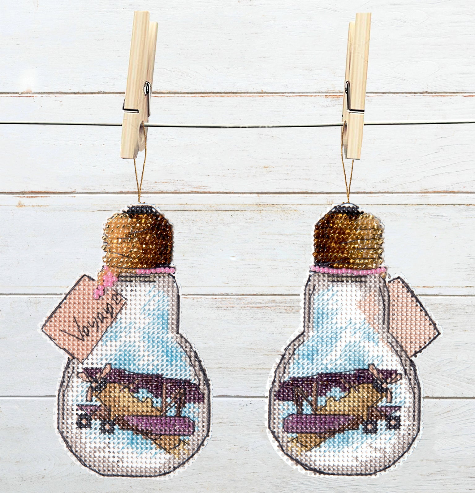 T-85C Counted Cross Stitch Kit featuring travel theme with colorful Madeira cotton floss and Preciosa Ornela beads.