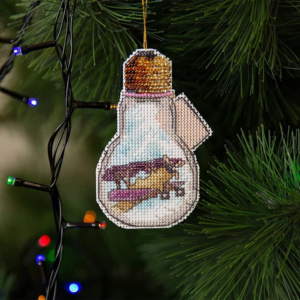 T-85C Counted Cross Stitch Kit featuring travel theme with colorful Madeira cotton floss and Preciosa Ornela beads.