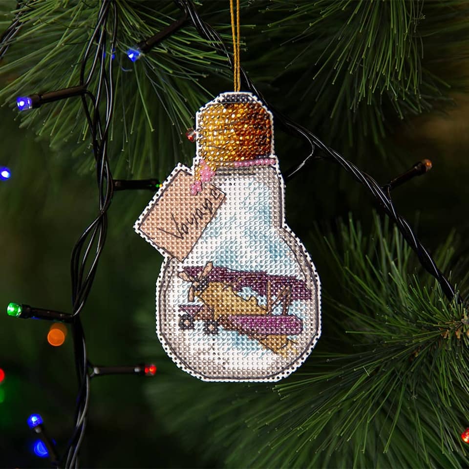 T-85C Counted Cross Stitch Kit featuring travel theme with colorful Madeira cotton floss and Preciosa Ornela beads.