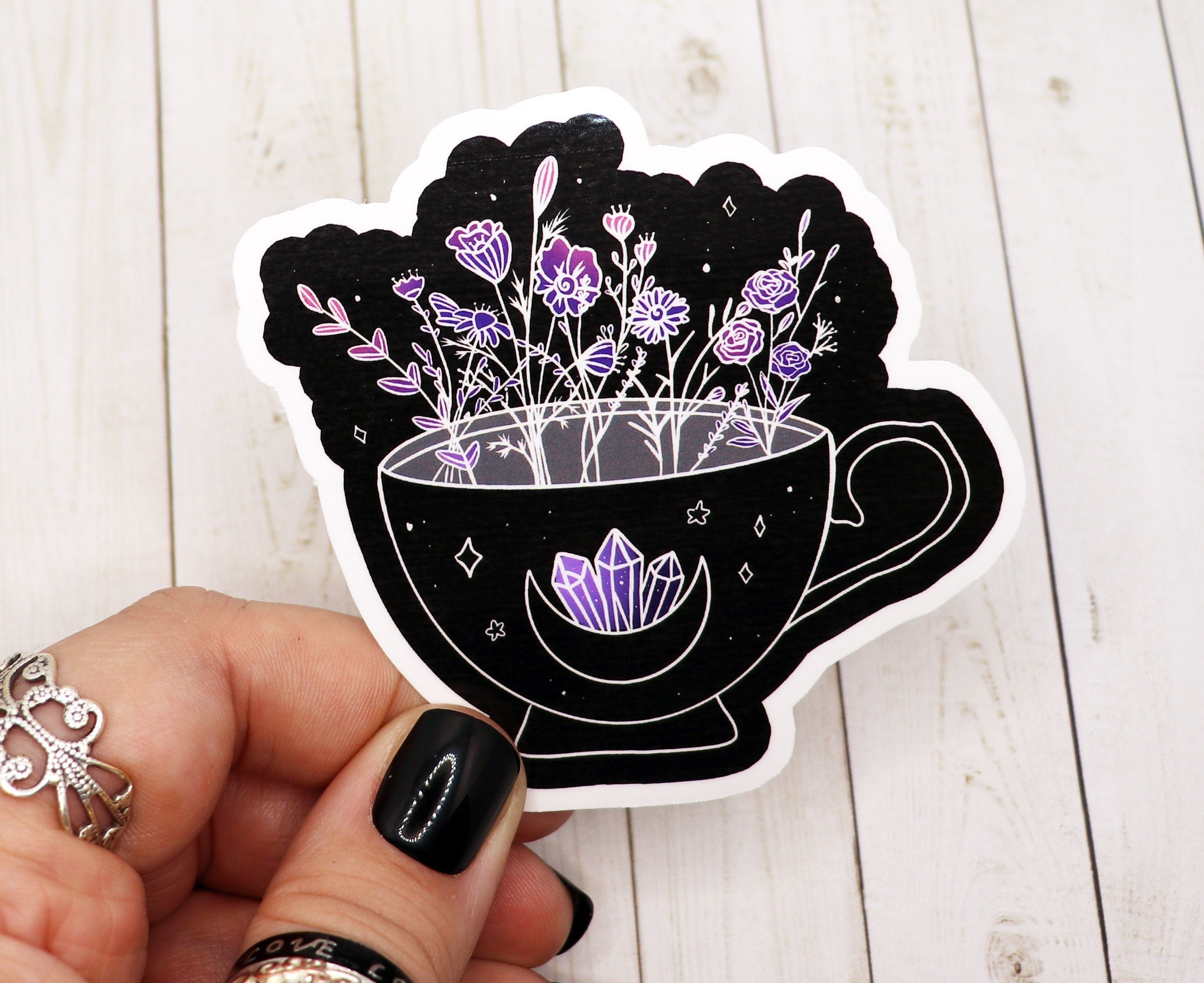 A collection of tea stickers featuring floral designs, perfect for personalizing various items like water bottles and laptops.