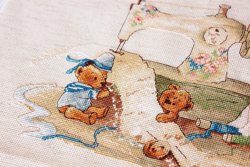 The Fairy-Needlewoman B1116L Counted Cross-Stitch Kit featuring Aida16 Rustic canvas, 38 Anchor colors, and a needle.