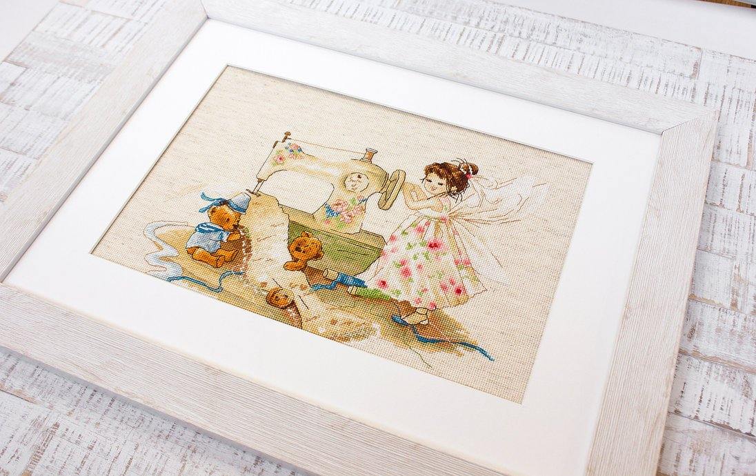 The Fairy-Needlewoman B1116L Counted Cross-Stitch Kit featuring Aida16 Rustic canvas, 38 Anchor colors, and a needle.