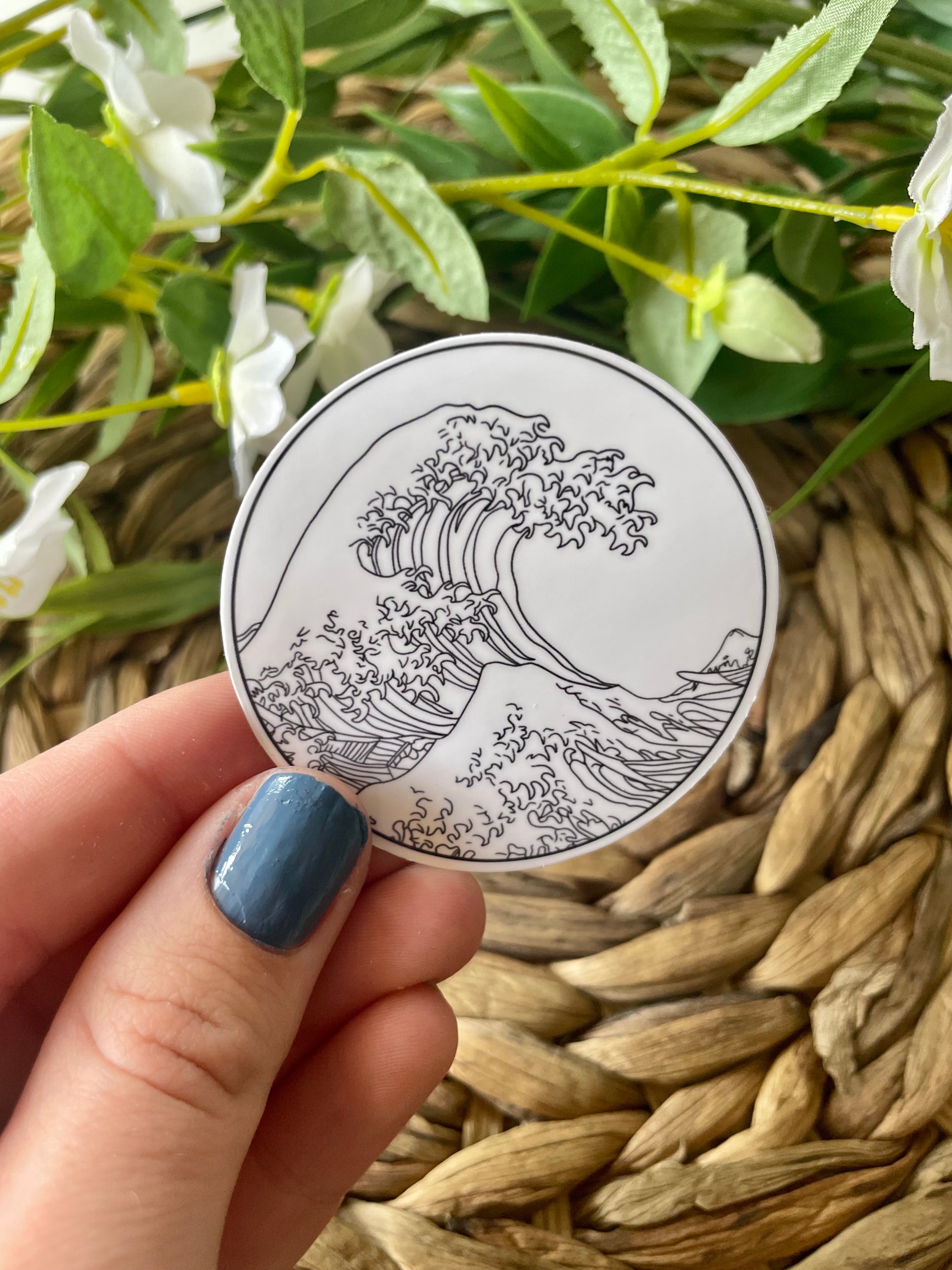 A vibrant sticker featuring The Great Wave off Kanagawa artwork, perfect for personalizing items.