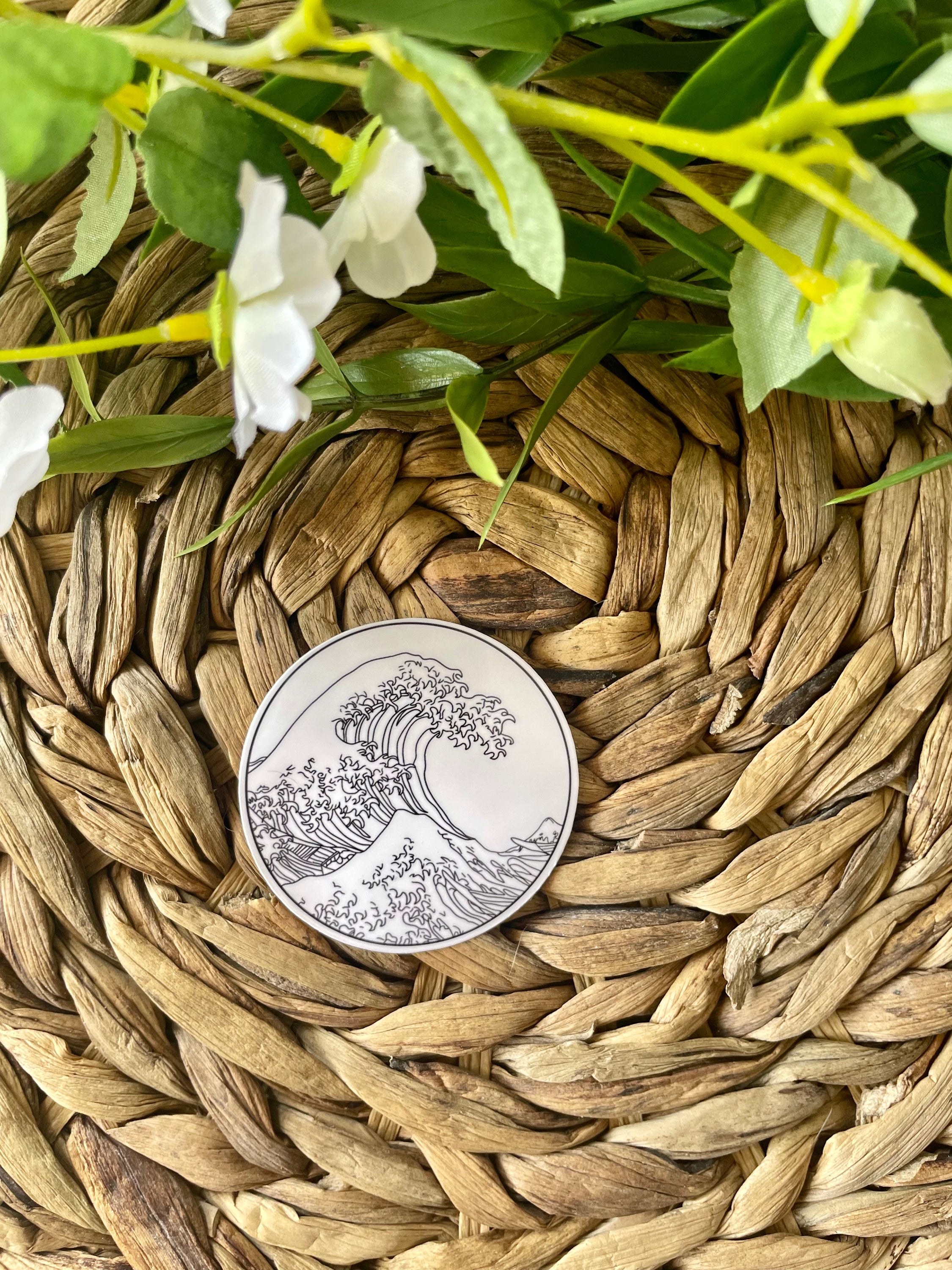 A vibrant sticker featuring The Great Wave off Kanagawa artwork, perfect for personalizing items.