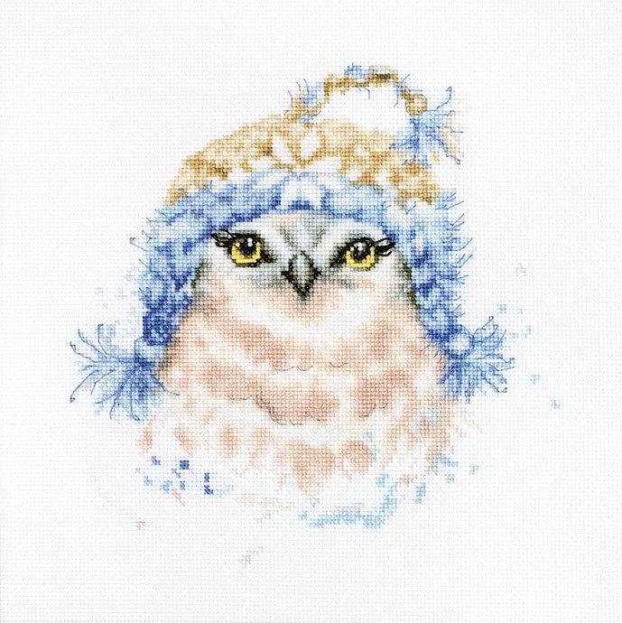 The Owl B2306L Counted Cross-Stitch Kit featuring a winter owl design with a hat, including threads and canvas.