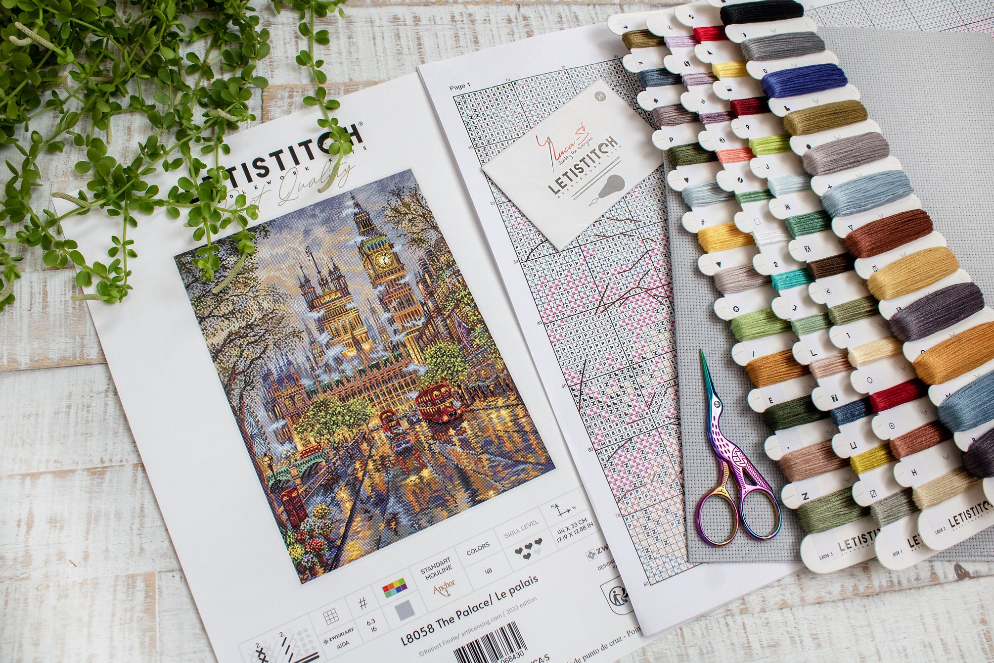 The Palace L8058 Counted Cross Stitch Kit featuring vibrant Anchor threads, Zw.Aida canvas, and included needle and instructions.