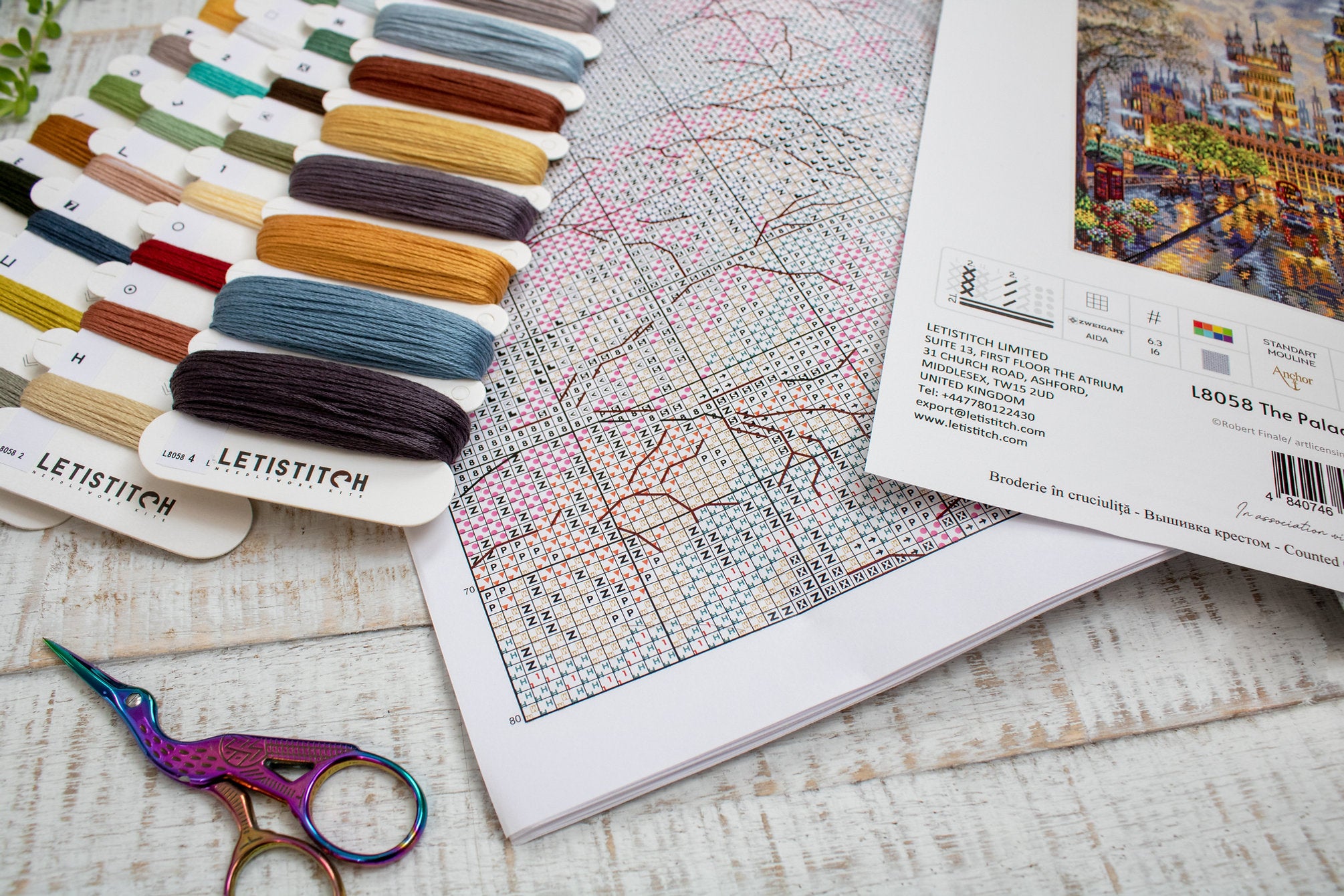 The Palace L8058 Counted Cross Stitch Kit featuring vibrant Anchor threads, Zw.Aida canvas, and included needle and instructions.