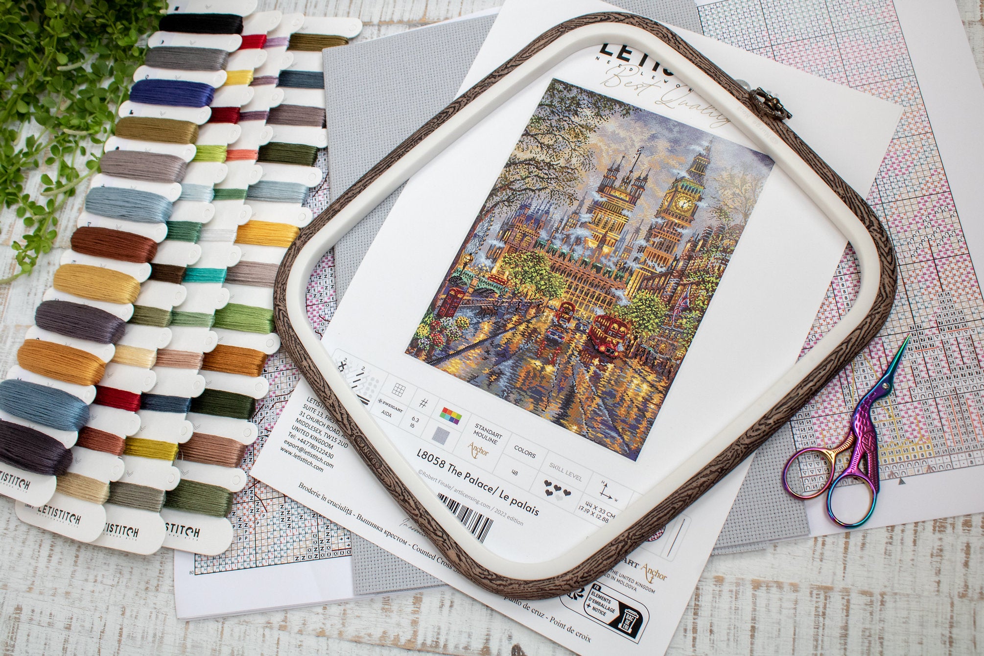 The Palace L8058 Counted Cross Stitch Kit featuring vibrant Anchor threads, Zw.Aida canvas, and included needle and instructions.