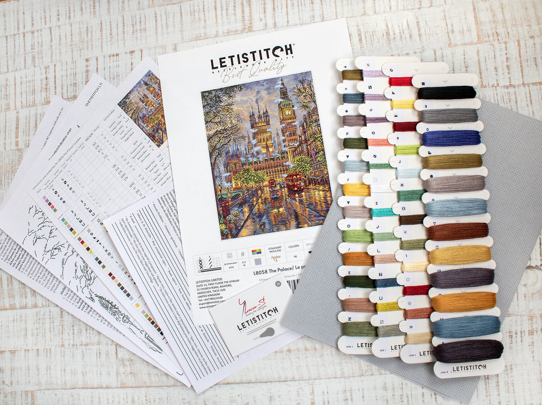 The Palace L8058 Counted Cross Stitch Kit featuring vibrant Anchor threads, Zw.Aida canvas, and included needle and instructions.