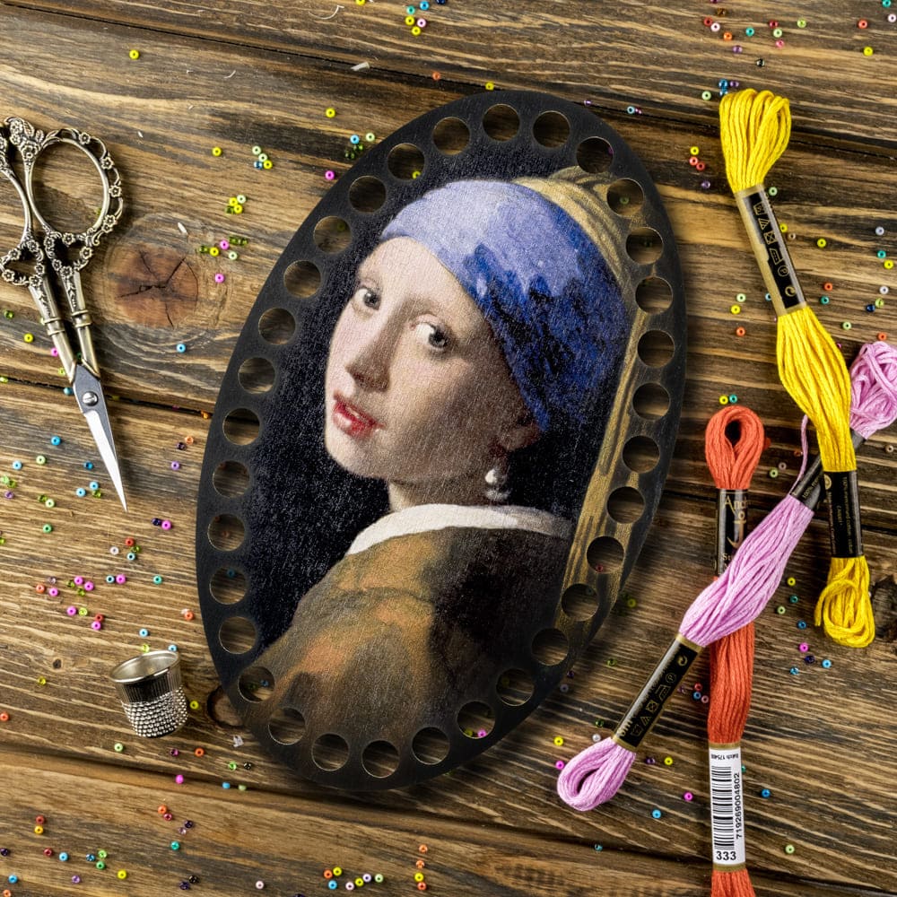 Thread Organizer FLZ(P)-025 featuring artistic designs and engraved numbers for thread sorting.