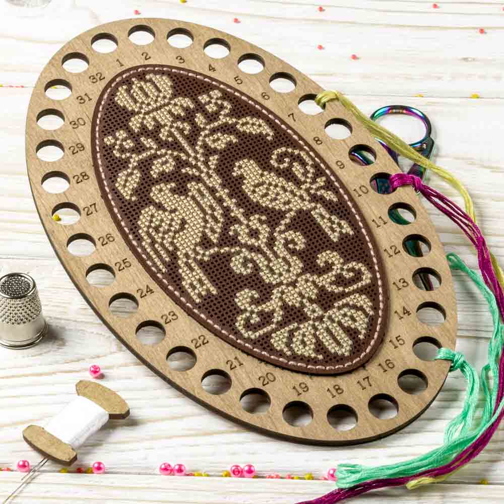 Thread organizer making kit FLTL-012 with artificial leather and embroidery materials, showcasing its components and design.