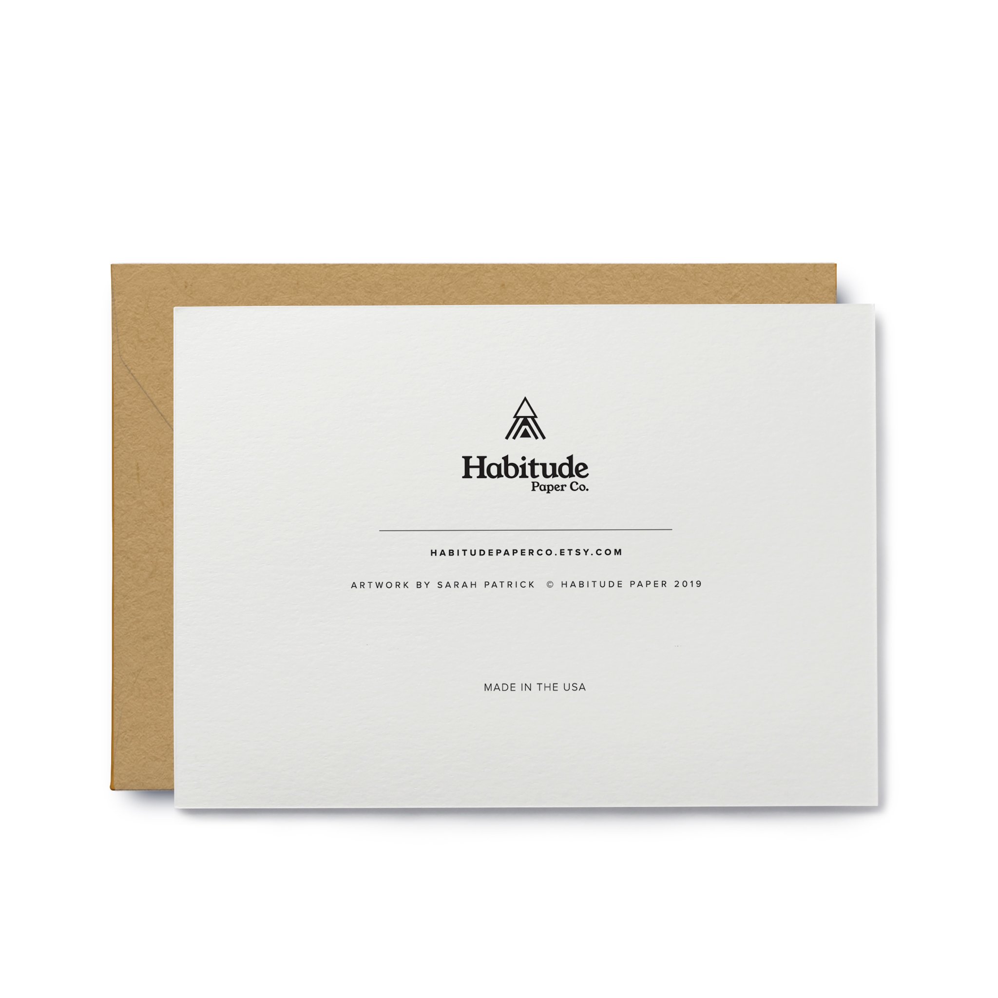 'Tis the Holidays Greeting Card displayed with a Kraft paper envelope, showcasing its festive design and quality materials.