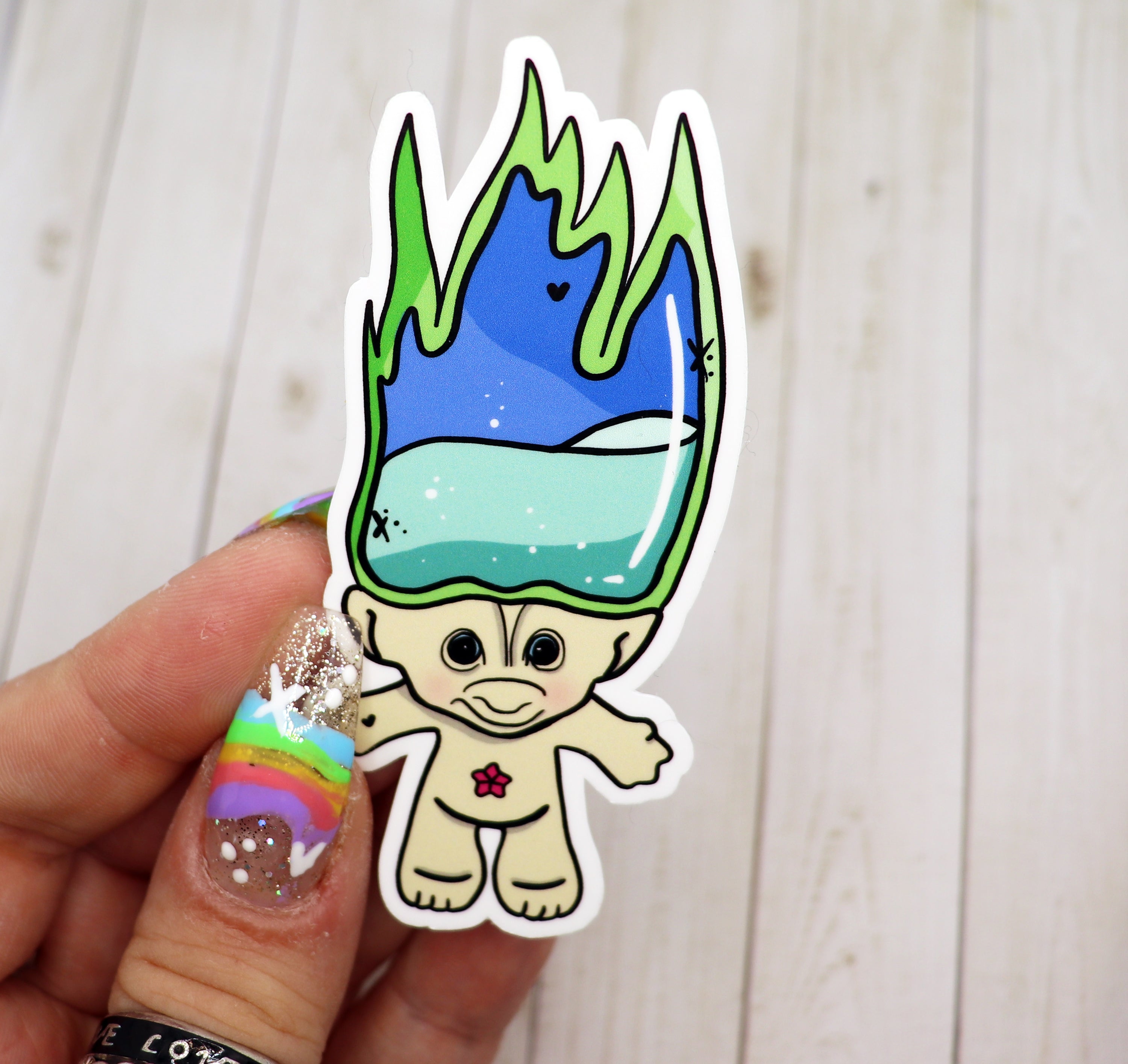 A colorful Troll Vinyl Sticker measuring 3.5 inches, showcasing vibrant designs suitable for various surfaces.
