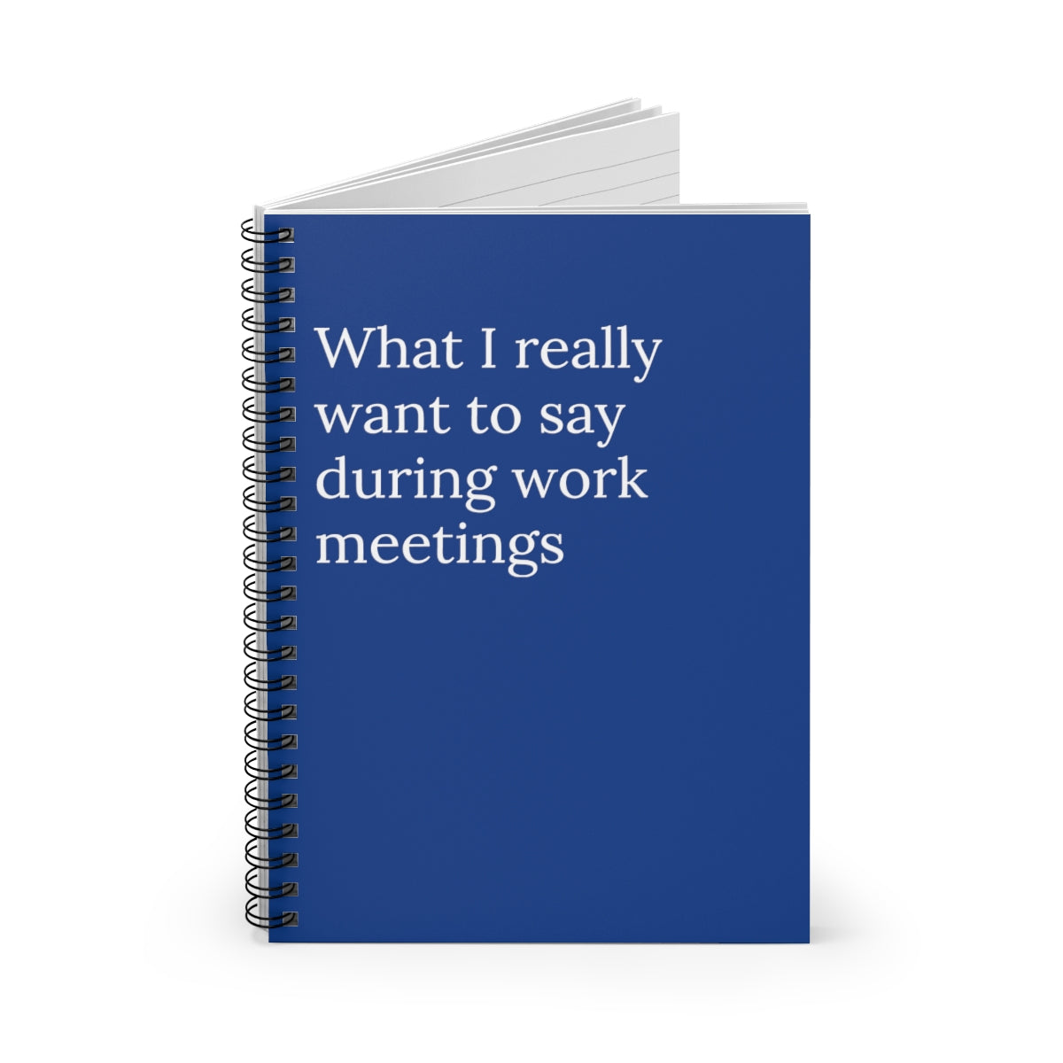 A humorous spiral notebook titled 'What I Really Want to Say During Work Meetings' with ruled line pages, perfect for office use.