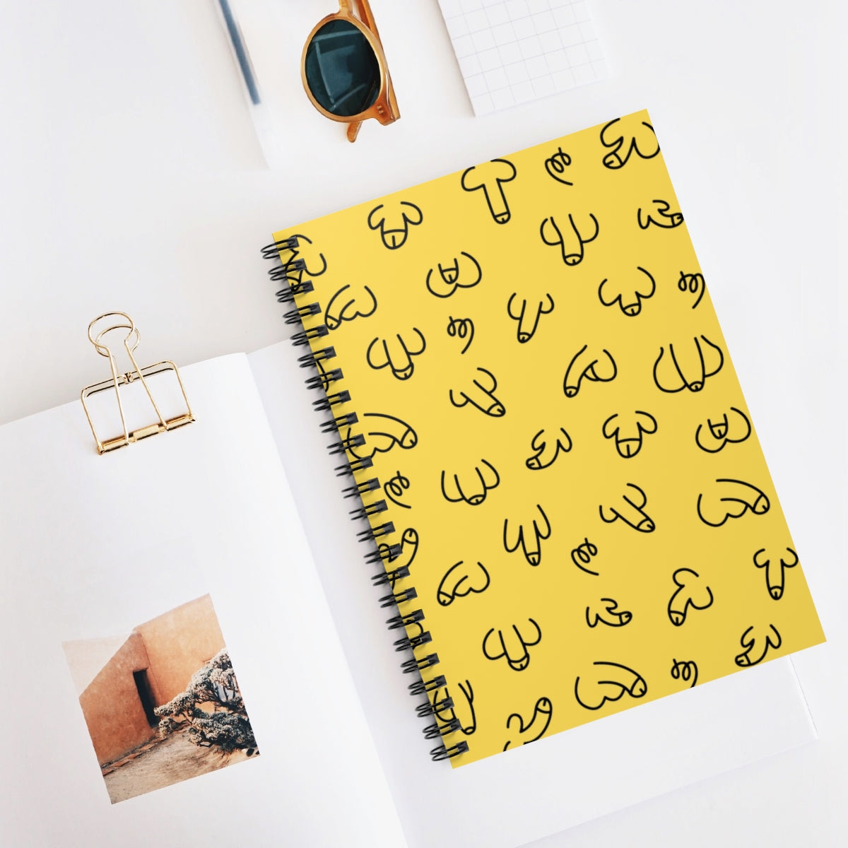 Willy Lined Notebook with black spiral binding and A5 size, featuring 100 lined pages for writing.