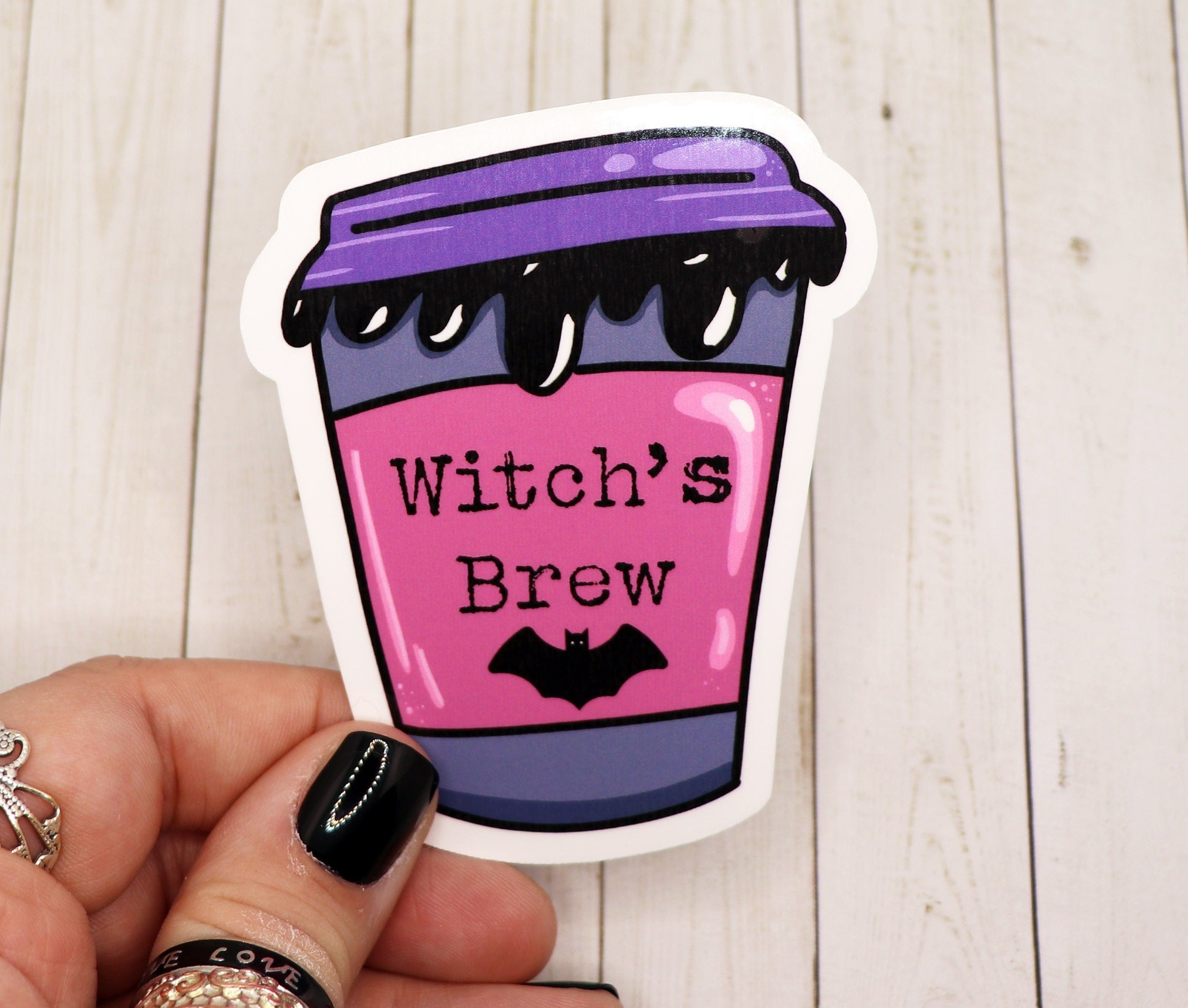 A 3-inch Witch's Brew Coffee Sticker featuring a whimsical design, perfect for personalizing various items.