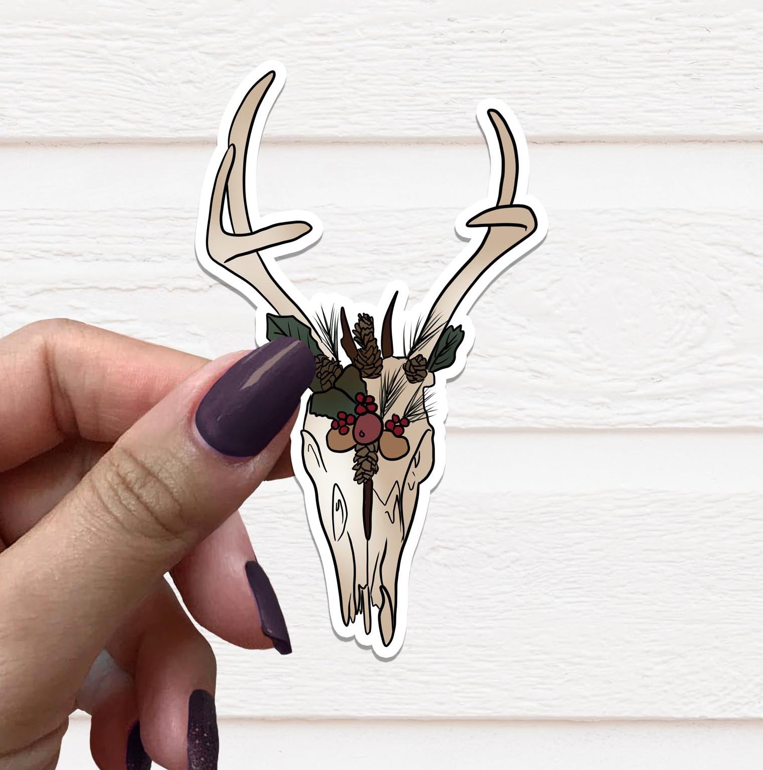 Witchy Yule Stag Skull Vinyl Sticker featuring intricate stag skull design on matte finish.
