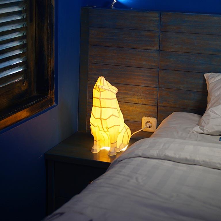 A beautifully crafted Wolf 3D Paper Model Lamp showcasing intricate details and a unique design, perfect for home or office decor.
