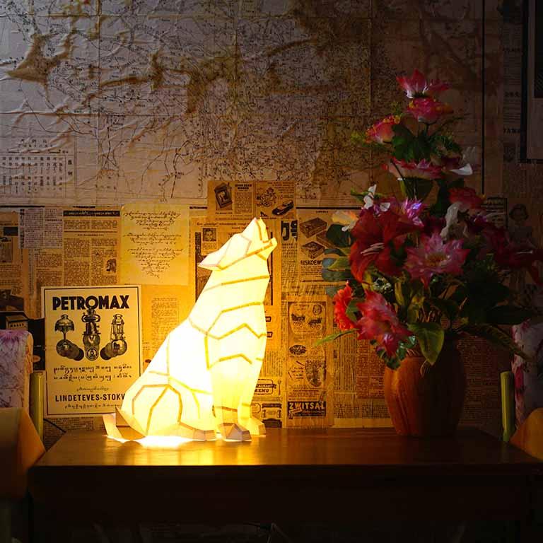 A beautifully crafted Wolf 3D Paper Model Lamp showcasing intricate details and a unique design, perfect for home or office decor.