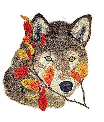 Embroidered patch featuring a wolf surrounded by autumn leaves, showcasing intricate details and vibrant colors.