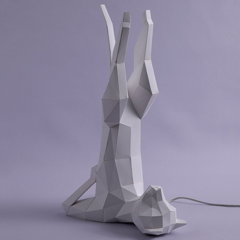 A beautifully crafted Yoga Cat 3D Paper Model lamp in a yoga pose, showcasing intricate paper art design.