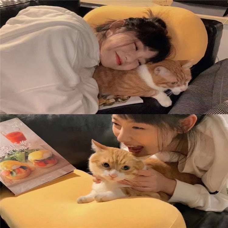 3D Neck Pillow made of memory foam with a soft yellow cotton cover, designed for travel comfort and support.