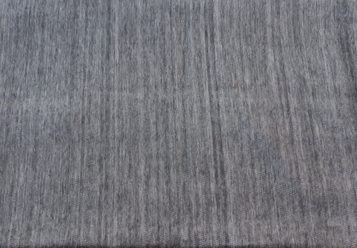 Cozy alpaca bed blanket in various colors, showcasing its soft texture and luxurious feel.