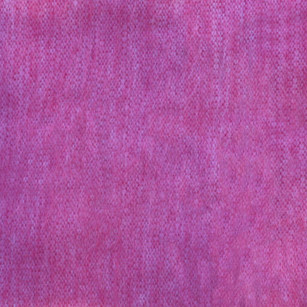 Cozy alpaca bed blanket in various colors, showcasing its soft texture and luxurious feel.