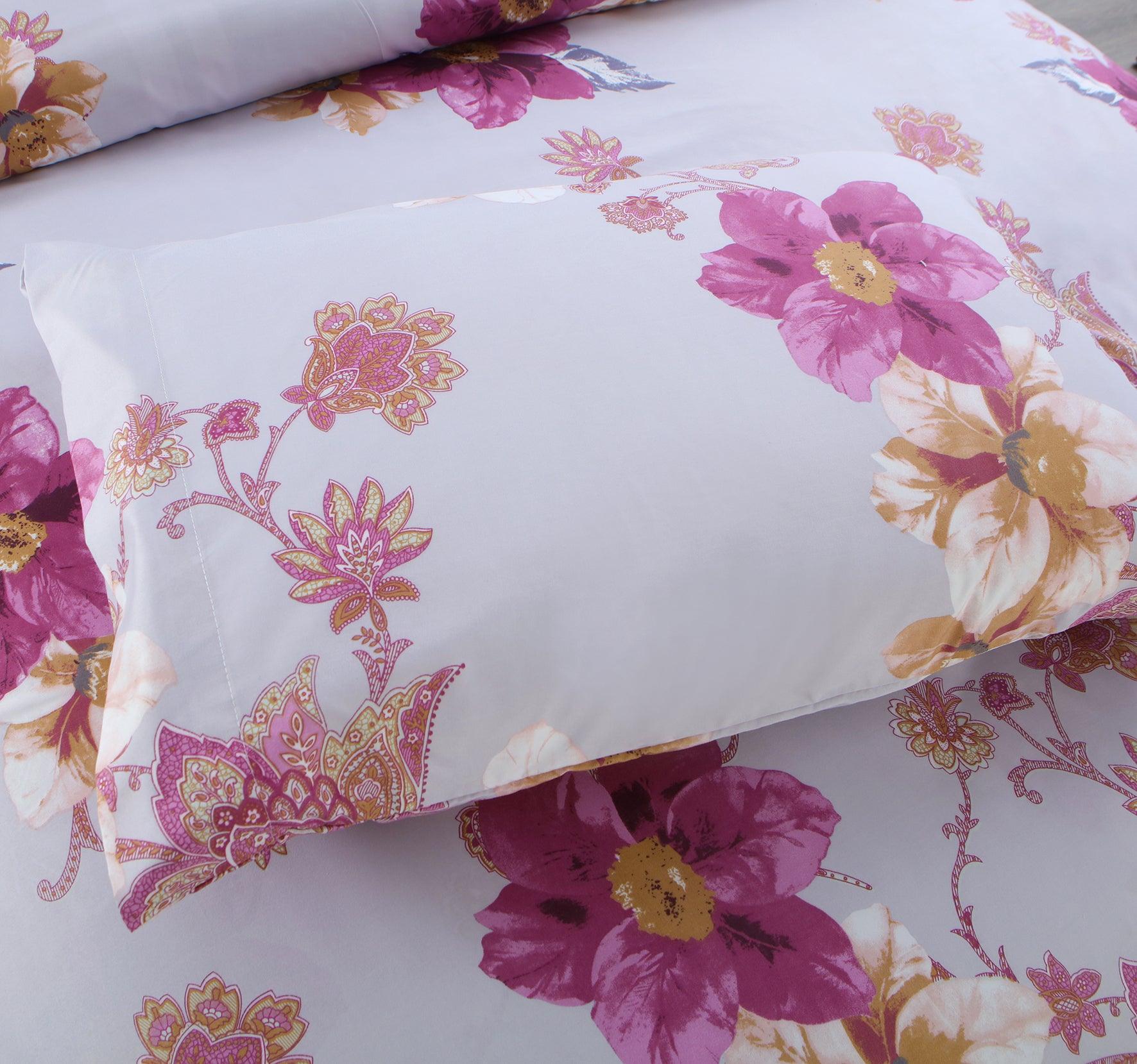 Belle Haven 6 Piece Sheet Set featuring vibrant colors and unique designs, includes flat sheet, fitted sheet, and four pillowcases.