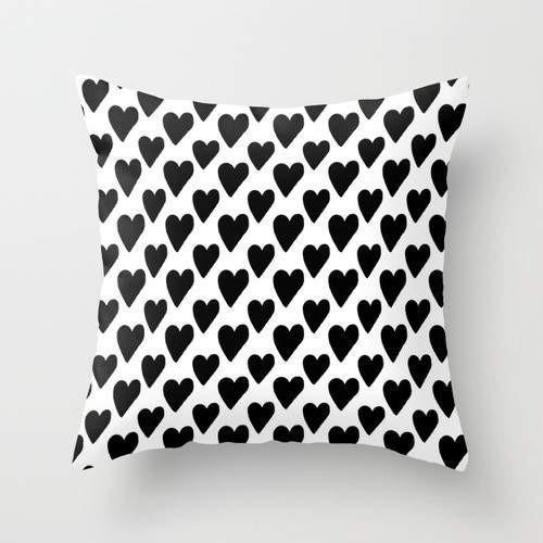 Black and white hearts cushion with a stylish design, featuring a double-sided print and concealed zipper, perfect for home decor.