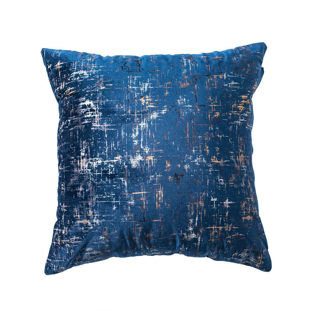 Blue velvet cushion cover with gold geometric stamping, showcasing a luxurious design suitable for various room settings.