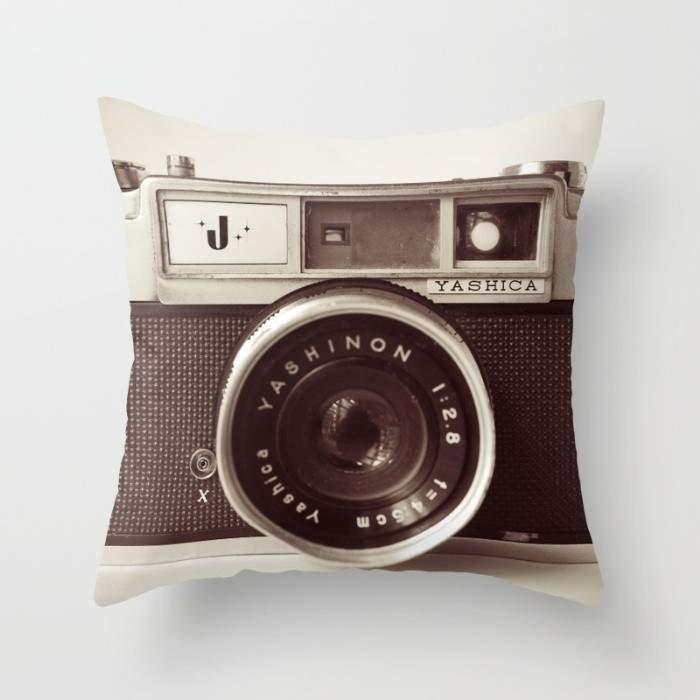 A stylish Camera Cushion/Pillow featuring a unique camera design, made from 100% spun polyester poplin fabric, measuring 16x16 inches.