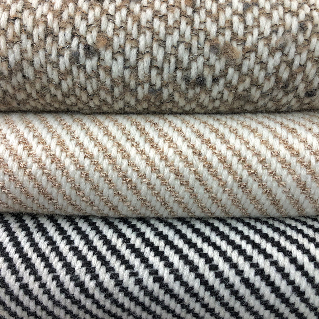 Chunky Camel Stripe Alpaca Throw showcasing luxurious texture and classic stripes, perfect for cozying up on a sofa or bed.