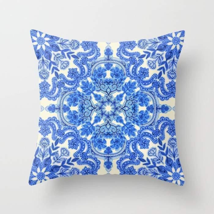 Cobalt Blue and China White Folk Art Pattern Cushion, showcasing vibrant colors and intricate design, perfect for home decor.
